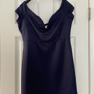 Navy dress, capped sleeves. Falls just above knees for you next occasion